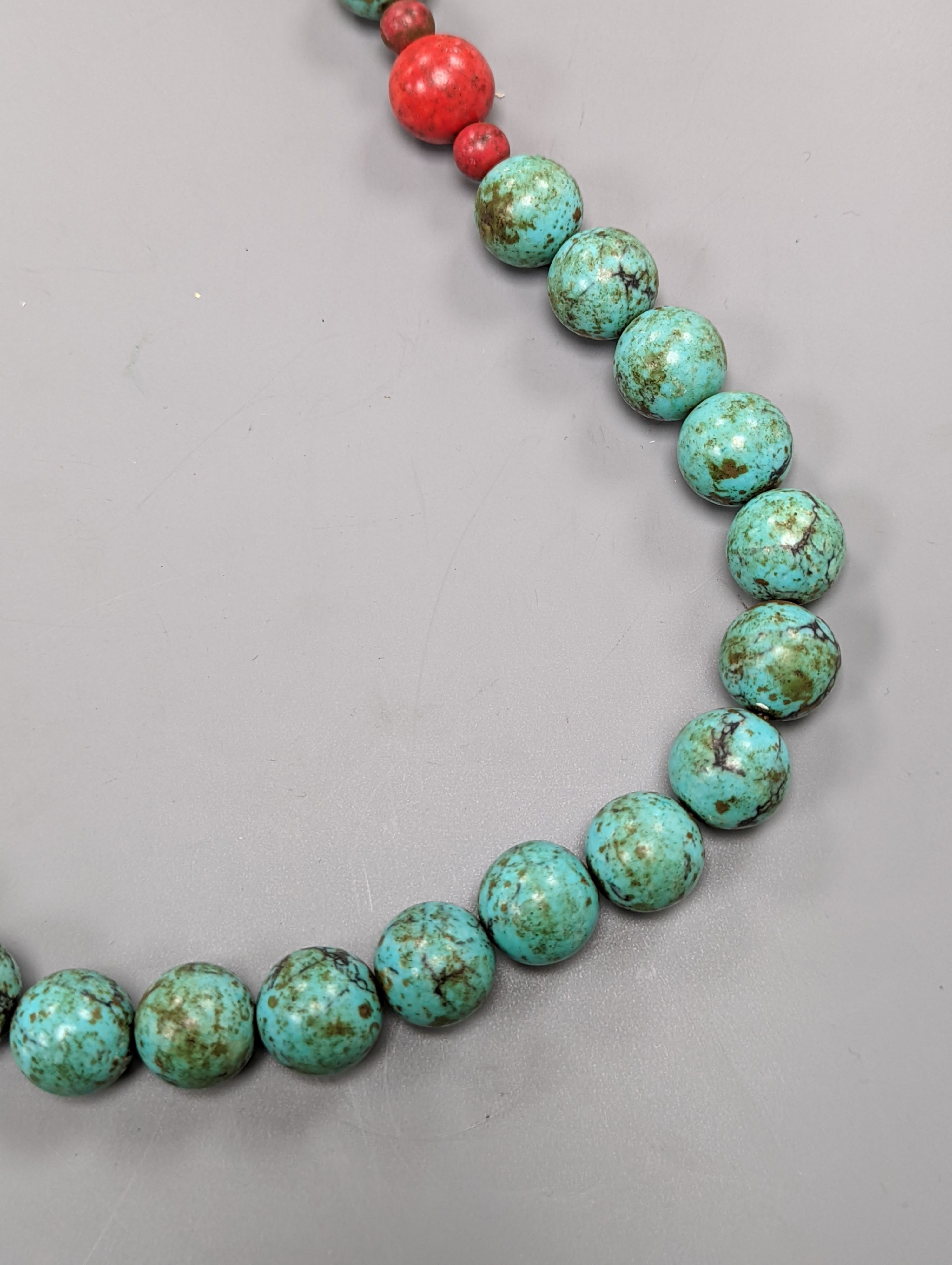 A Chinese turquoise matrix court style necklace in a hardwood box